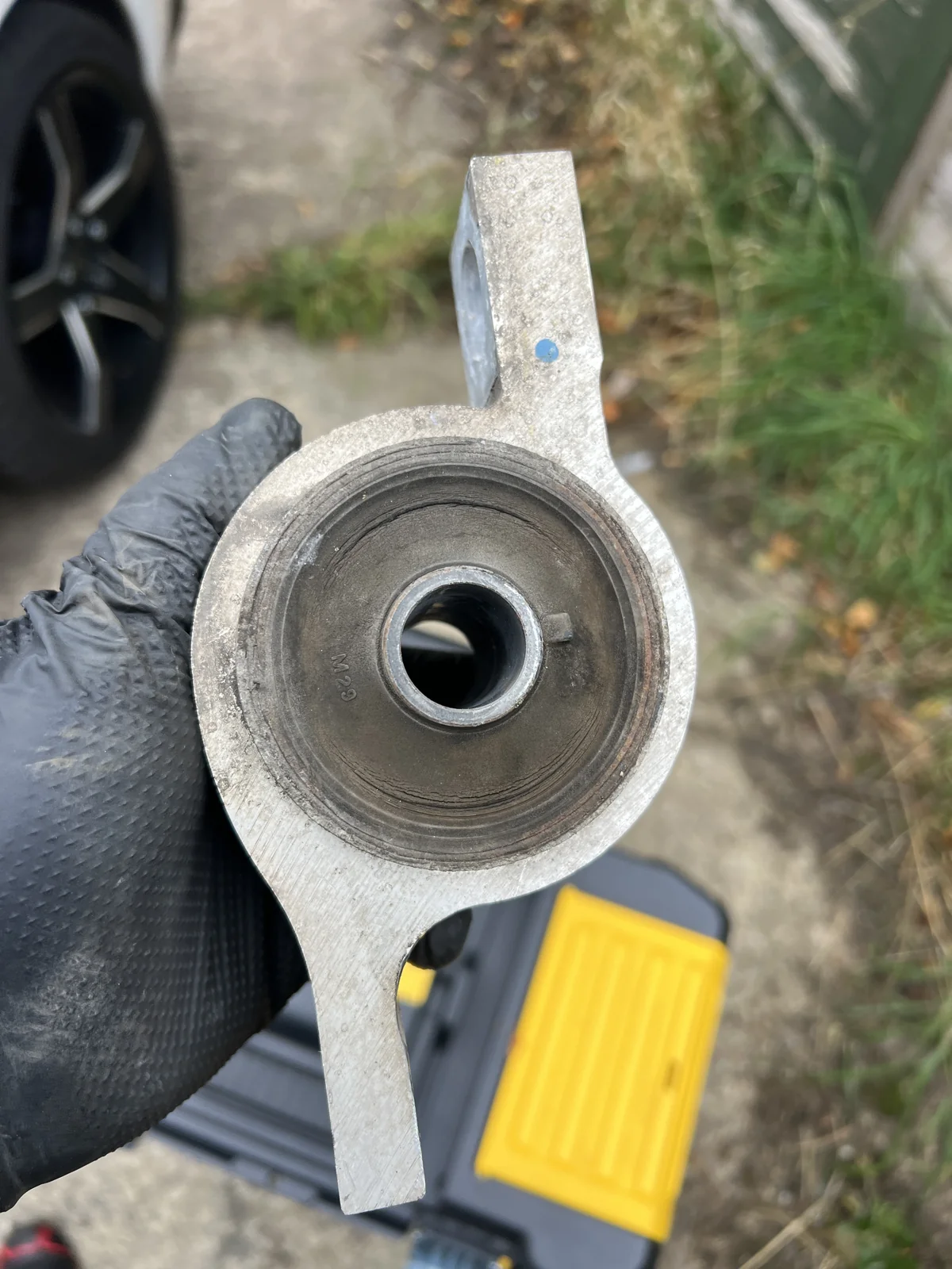 Worn suspension bushing removed from our Lexus IS 300h